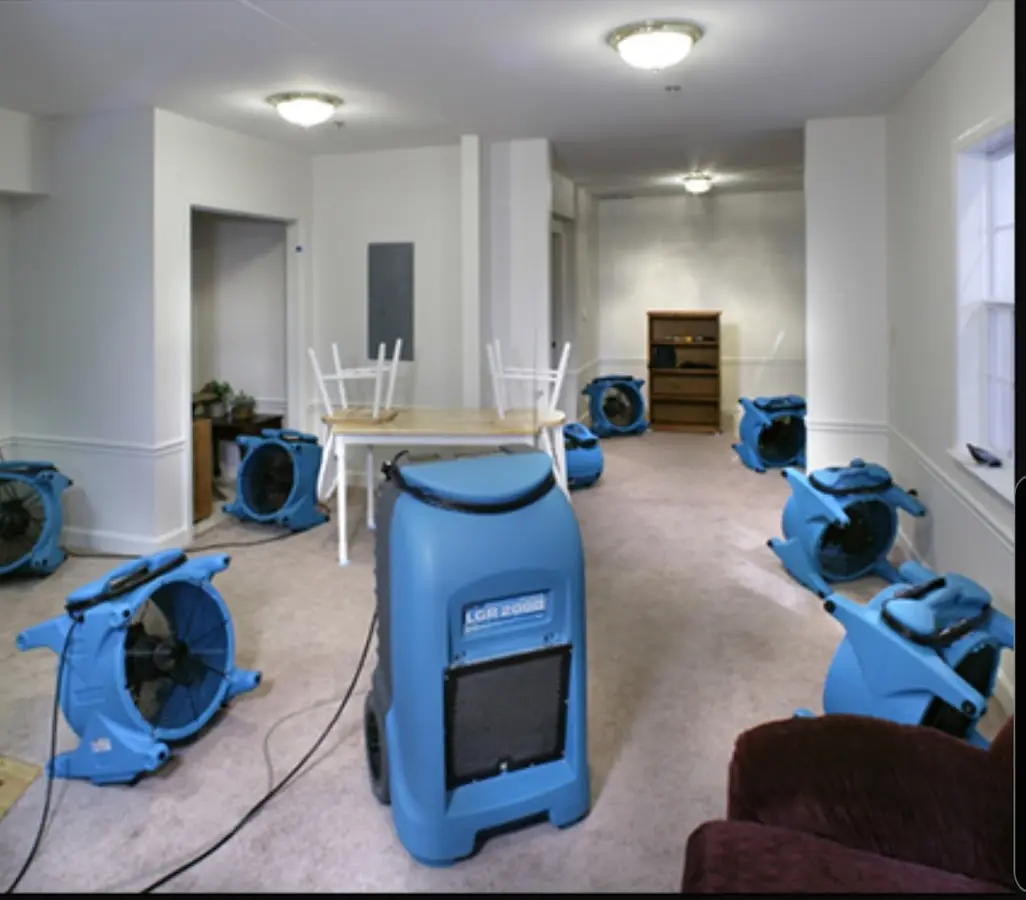 Air movers and dehumidifier setup for Water Damage Restoration in Windham